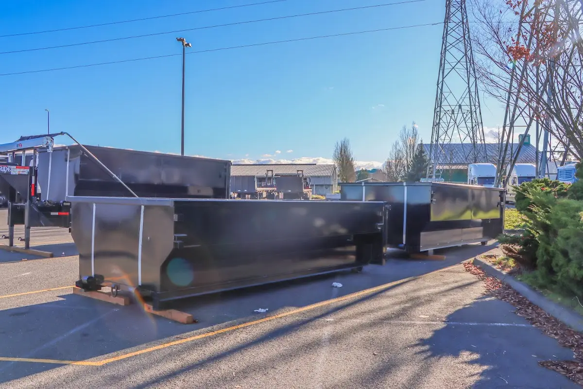 Roll-off dumpster ready for waste disposal at job site for Yard Waste Dumpster Rental in Alvin